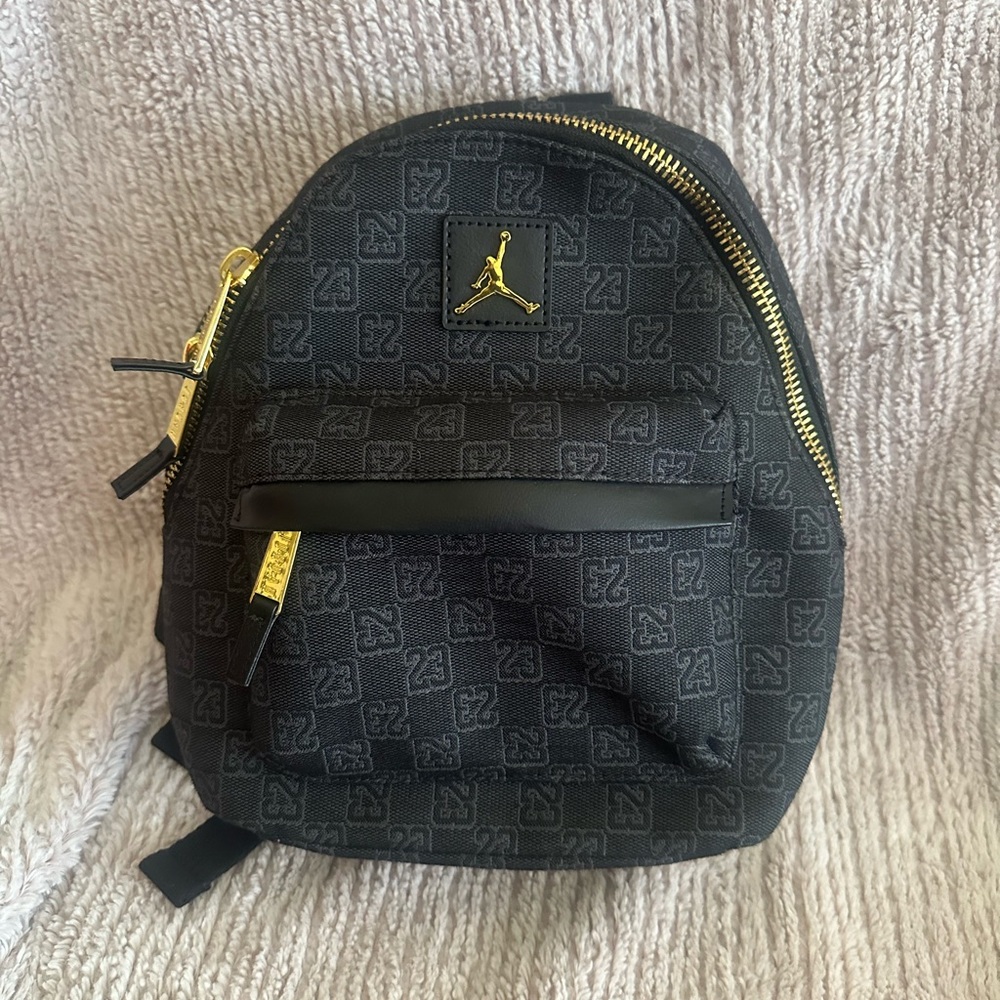Jordan Black and Gold Mini Backpack with Iconic Design